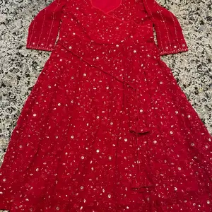 Georgette Anarkali Suit in Red Color with Elegant Design and Comfortable Fit