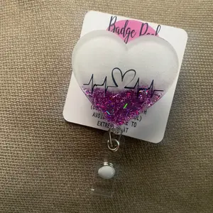 Heart beat badge reel