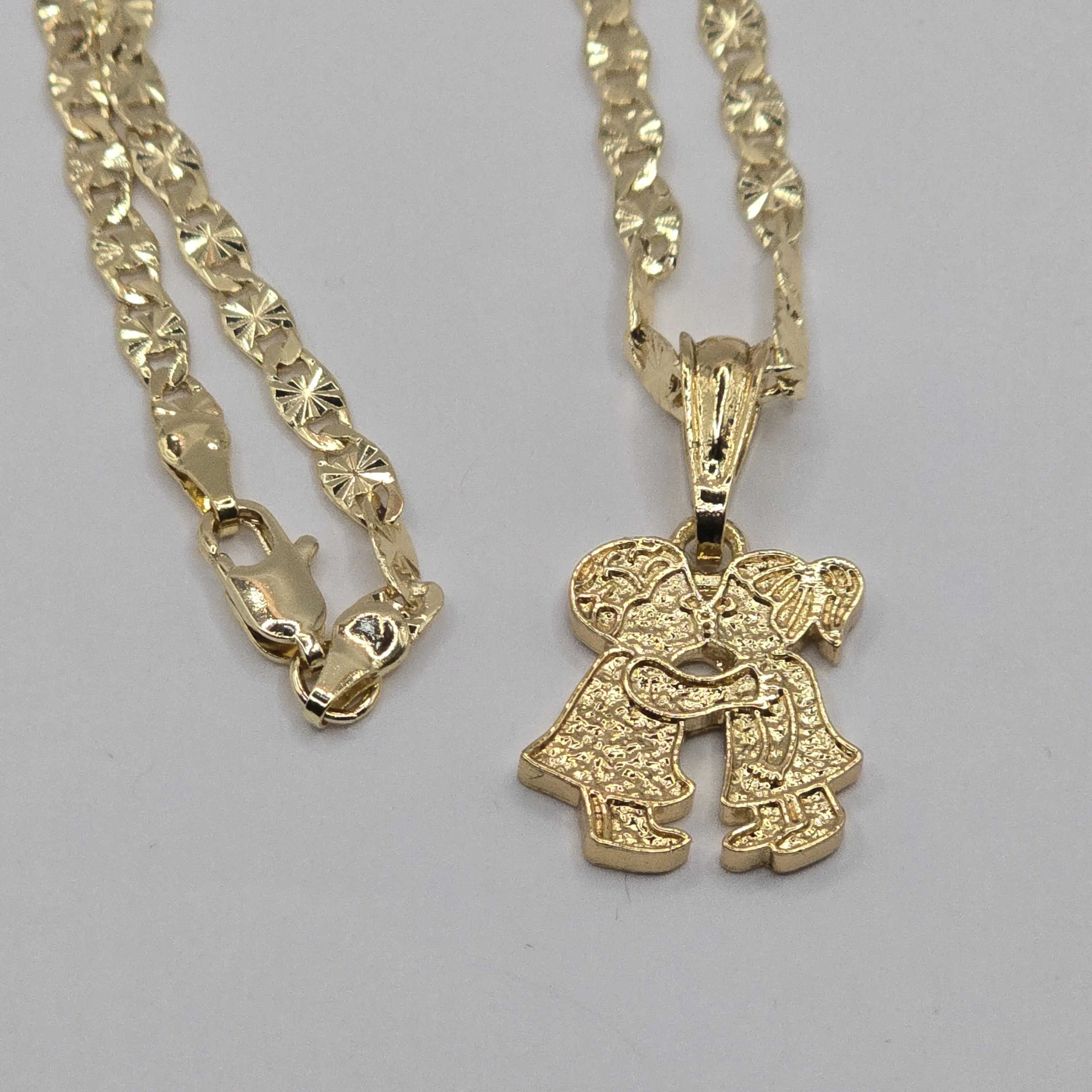 Couple with necklace gold-plated. Couple with necklace gold-plated.