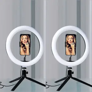 Ring Light (10inch) Desktop Tripod with Phone holder and  3 different types of LED Light. Fits a variety of iPhones from regular size to Pro Max. USB connection.