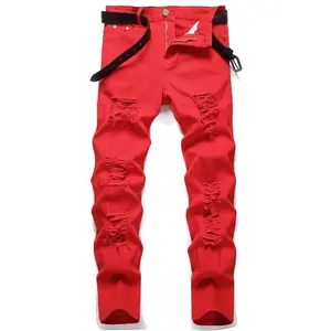 Men's red tight jeans, tattered and fashionable denim jeans