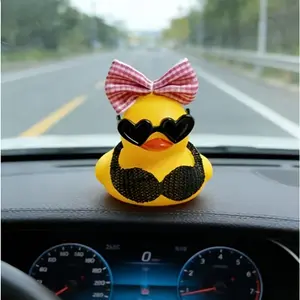Sexy little yellow duck, wearing sunglasses and bow headdress, is an essential accessory for automobile interior, Car Interior Decor, suitable for motorcycles and bicycles.