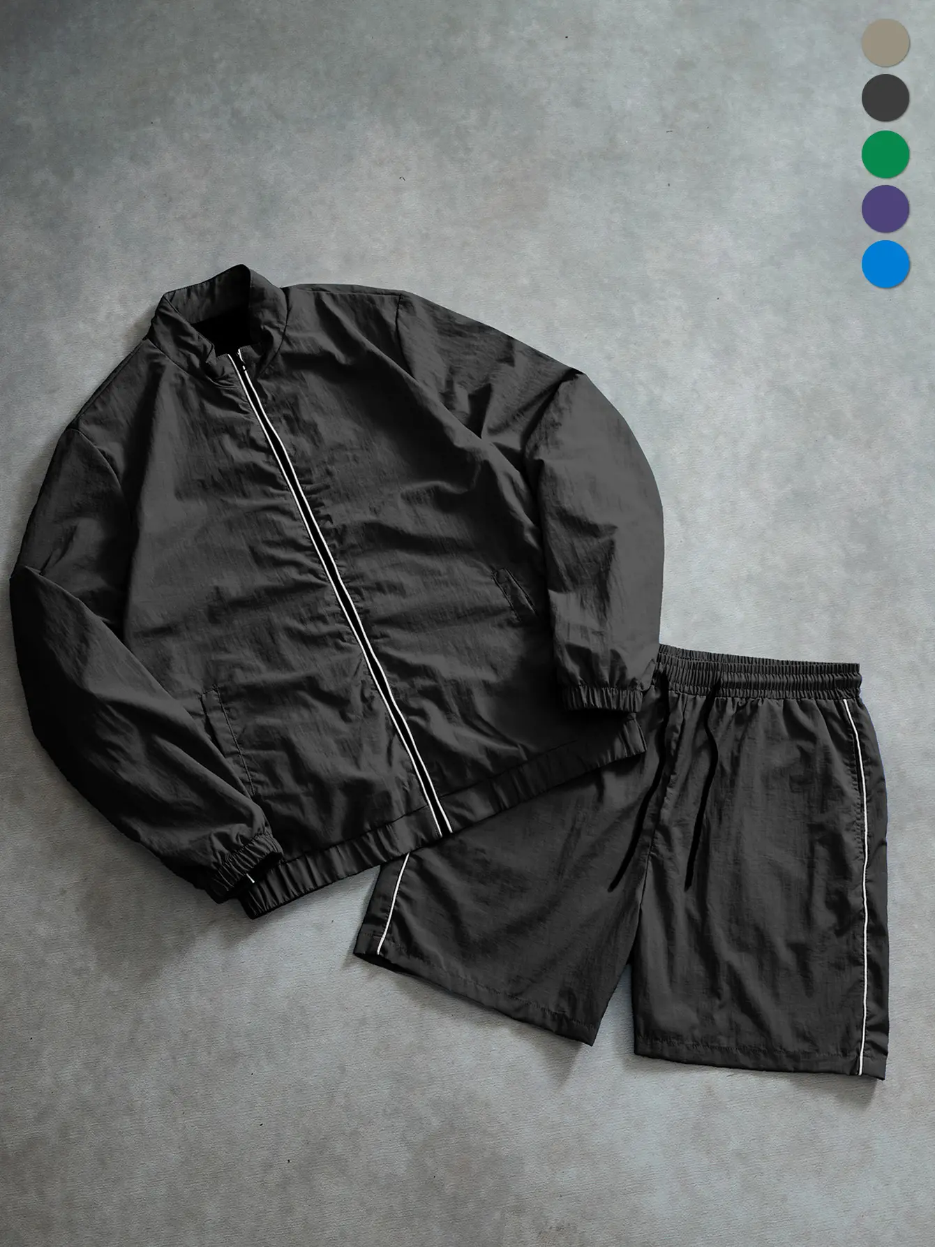 Men’s casual sports set for spring and autumn, fashionable two-piece design with a minimalist loose fit for outdoor wear. Includes a zip jacket/outer layer and shorts. Polyester fabric that is quick-drying, breathable, sun-protective, and comfortable—idea