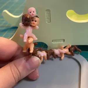 Skin baby caterpillar three heads