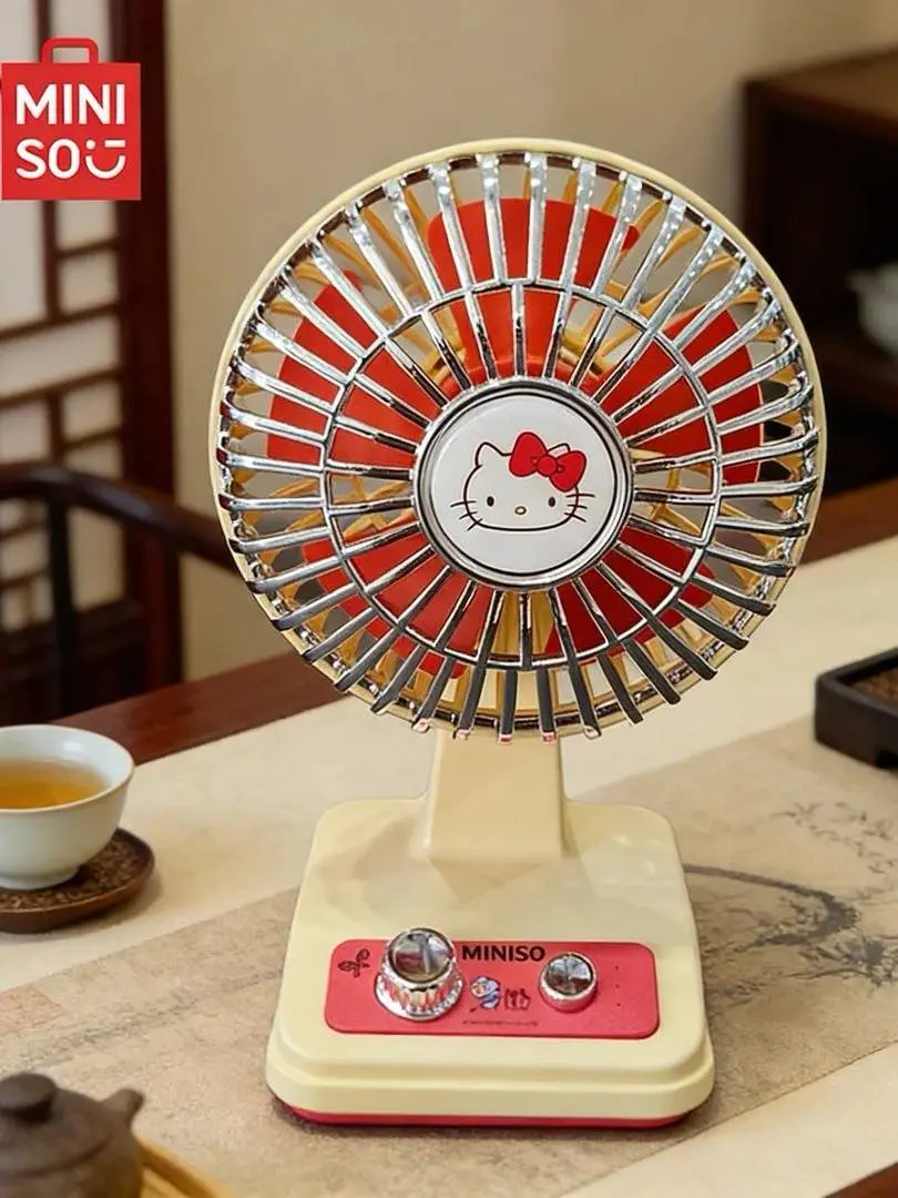 MINISO Genuine Hello Kitty Retro Mini Fan, cute cartoon desktop fan with quiet operation. Compact and practical for home, office and outdoor use. In stock now, lovely daily gadget and sweet gift for Hello Kitty fans.