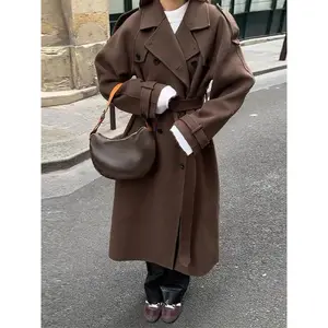 Elegant women’s wool overcoat with belt, loose fit, lapels, double-breasted, long sleeves — autumn/winter 2025 trench coat