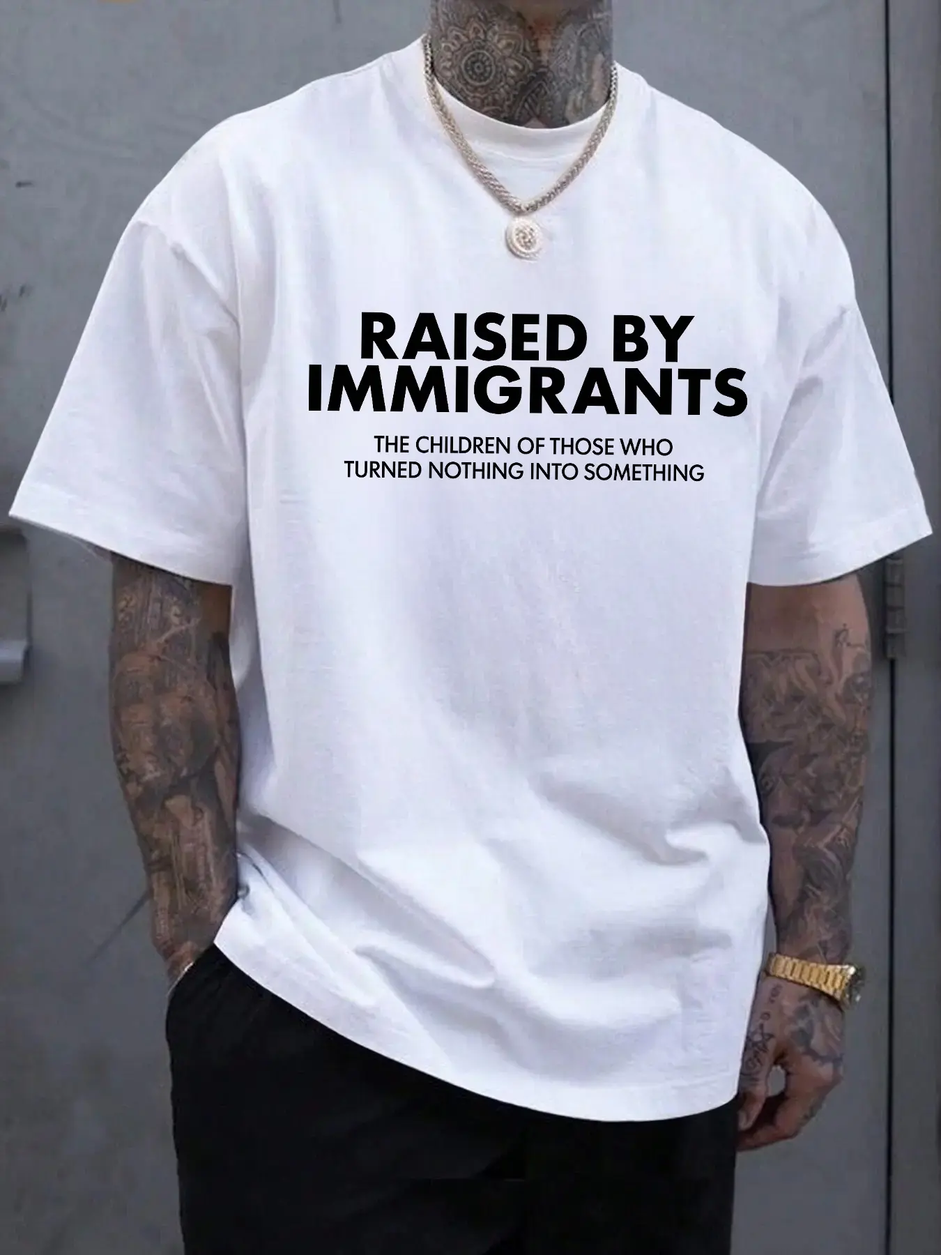 Raised By Immigrants Graphic T-Shirt - First Gen Pride Oversized Cotton Short Sleeve Fitted Tee, Meaningful Streetwear Top for Men & Women, Inspirational Family Heritage Gift