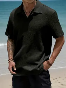 One solid-color textured men’s short-sleeve polo shirt with a half-button placket; vacation casual style. Black is the primary color—solid yet substantial and refined. Classic notched collar design with a clean, structured look. Half-button front adds sim