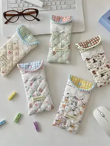 Soft and adorable quilted bag with a healing, cute pattern design. Features a fresh lace trim and soft rounded edges with delicate embellishments. A casual, minimalist, and stylish handheld bag that is versatile and easy to carry Casual Fashion Bag