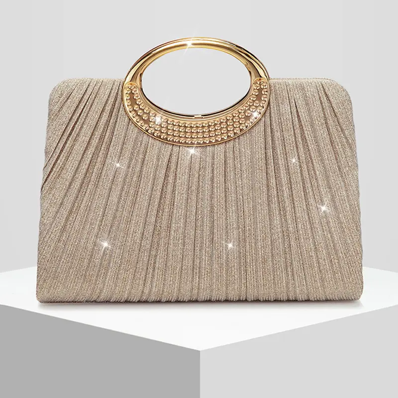 The new ladies' ring pleated shiny dinner bag has a high-end feel, with a hand-held bag for evening wear, formal dress, wedding gifts, and wedding season. It is very suitable for weddings, conferences, banquets, parties. The best gift for women