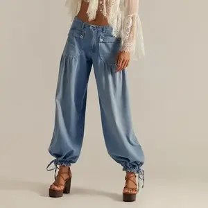 Women’s light blue baggy wide-leg jeans — casual mid-rise balloon jogger denim pants with a drawstring cuff and loose fit; trendy women’s baggy wide-leg jeans for daily wear, boho, and street outfits