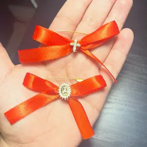 Pregnancy Protection Pin with Elegant Red Ribbon and Sparkling Centerpiece for Maternity Wear