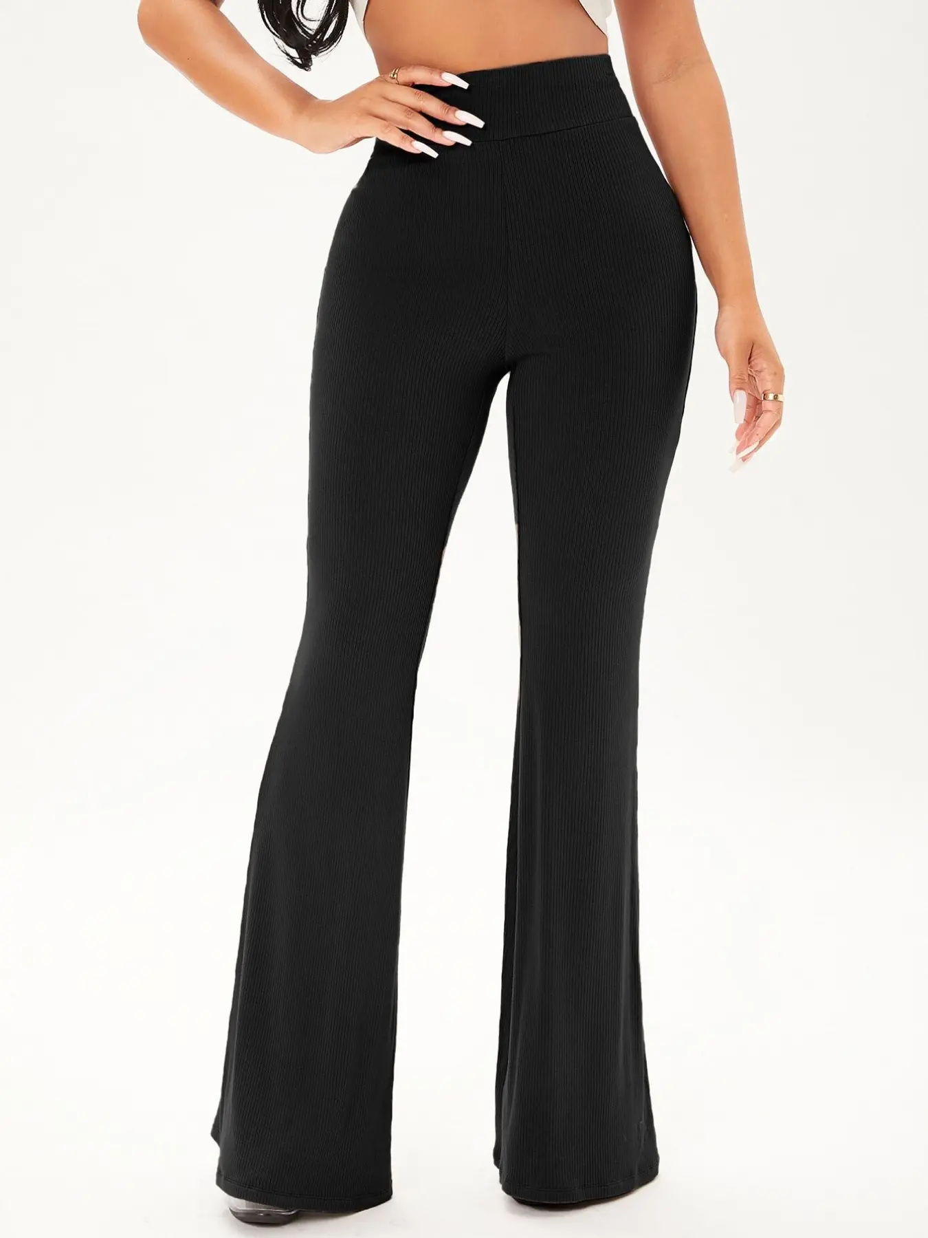 A women's black fashionable Minimalist office style slim fit micro flared pants, Womenswear, Office Work Chic, with a micro flared design that accentuates curves and is suitable for commuting to work, shopping, and outdoor wear, Work Office Clothes