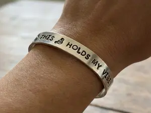 "This bottle holds my vibe" Hand-stamped Aluminum Bracelet