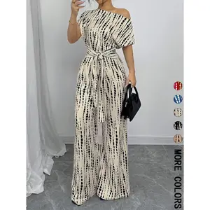 Women’s all-over print lace-up front jumpsuit, spring and autumn casual asymmetrical-collar jumpsuit, women’s everyday wear GARMENTARY