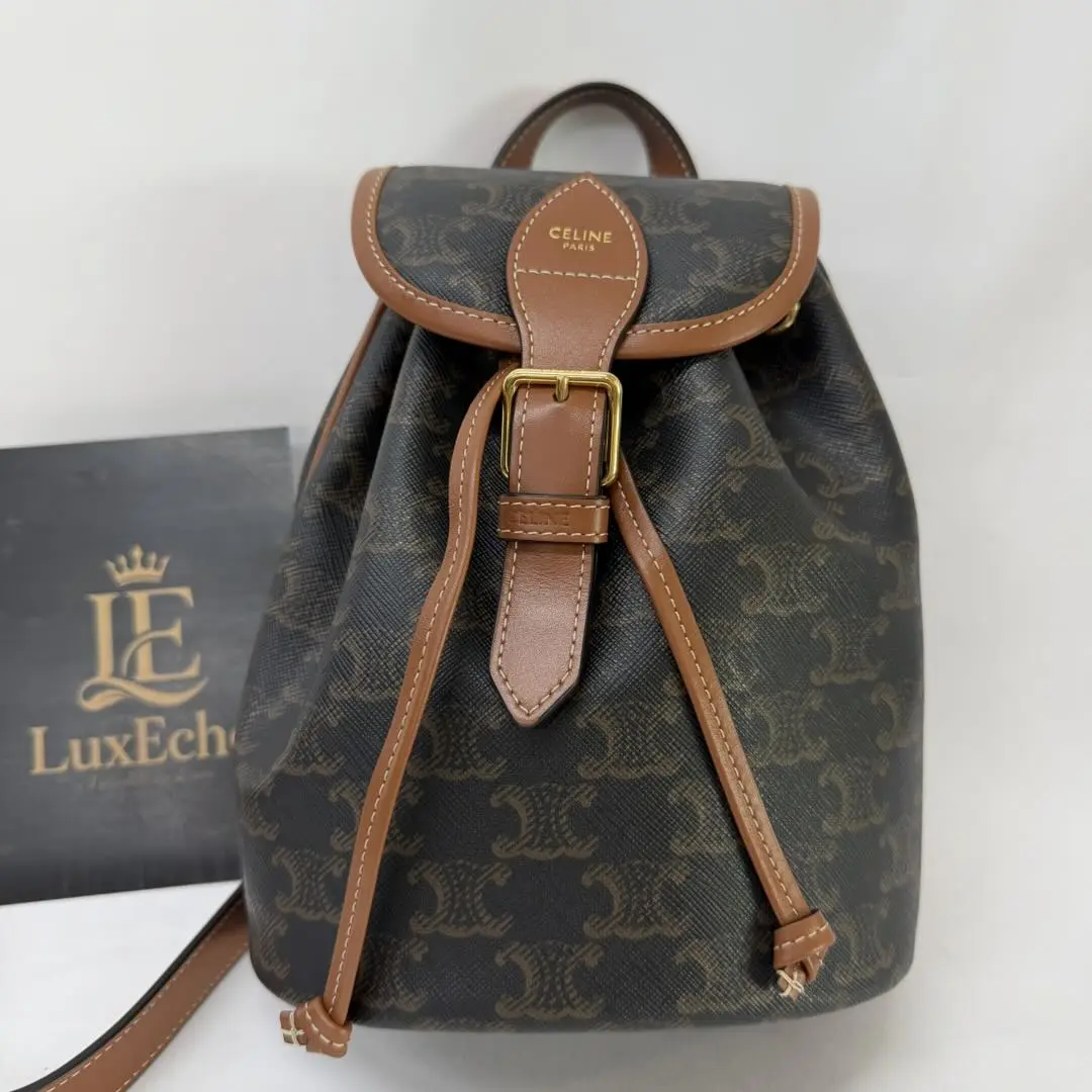 Pre-owned Celine Mini Folio Backpack in Triomphe Canvas with Calfskin Leather Trim
