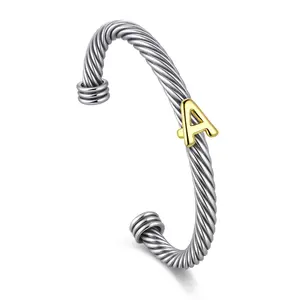 Mytys Cable Bracelets for Women Adjustable Mix Metal Stackable Letter Bracelets Two Tone Twisted Wire Cuff Bracelets Elegant Design