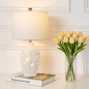 One White Ceramic Table Lamp with Hollow-Carved Leaf Pattern, Modern Bedside Lamp with Fabric Drum Shade for Bedroom, Living Room, Entryway Decor