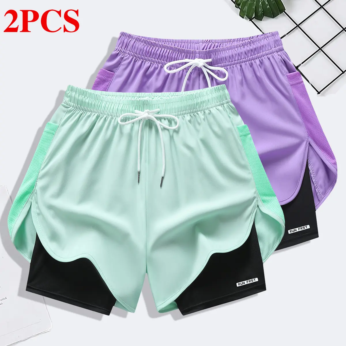 Two sets of women’s summer shorts: double-layer faux two-piece bermuda shorts made from breathable, quick-drying compression fabric with an elastic waistband featuring a drawstring and side mesh pockets—ideal for fitness training, casual wear, and running