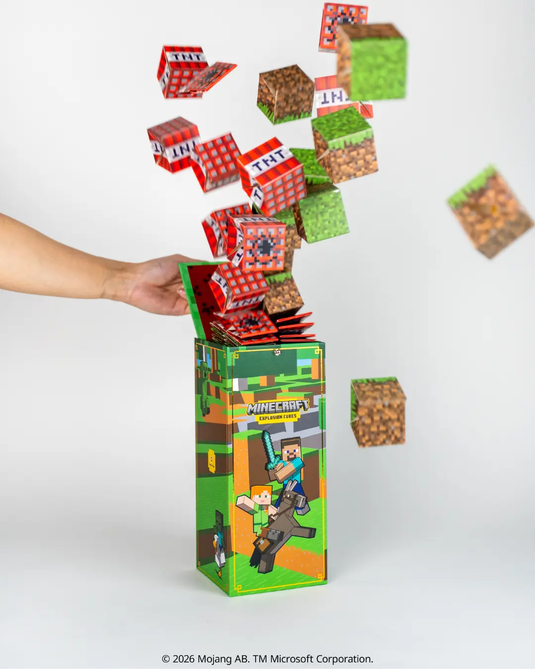 Minecraft Block Burst By Send A Cake - An exciting gift for all occasions! - A burst of Minecraft Blocks reveals a stack of delicious cake cubes! The Minecraft Block Burst delivers a playful, blocky reveal and a sweet treat all in one.