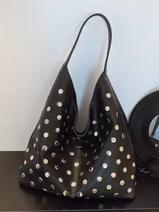 Simple stylish black and silver hollowed-out one-shoulder pu tote bag, bright metal silver polka dot hollowed-out lazy wind wide shoulder strap does not press the shoulder, retro daily shoulder bag, suitable for shopping and dating