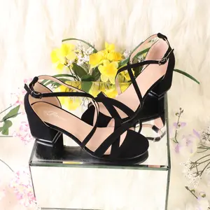 Woman heel open toe criss cross strap around the foot ankle strap with buckle and block heel