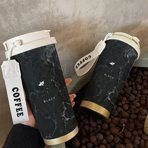 A 530ml (18.7oz) double-walled insulated floral coffee cup, designed to be leak-proof, making it perfect for travel. It comes with a handle and lid, suitable for both hot and cold beverages, and is an ideal gift for occasions like Valentine's Day