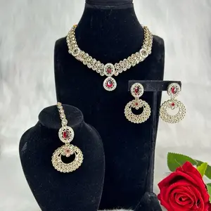 Elegant Gold Tone Polki With Ad Necklace With Earrings And Tikka Set.