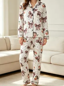 Luxurious deer-print women’s pajama set, including a soft button-up long-sleeve top and matching pants in the same color. Elegant holiday casual wear—comfortable, warm, and stylish; suitable for all seasons and blending home comfort with a relaxed style.