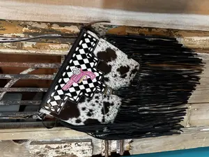 Tooled Leather & Cowhide Crossbody with Fringe