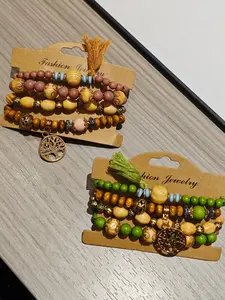 A 4-piece set of fashionable Bohemian style multi-layer life tree tassel wooden bead bead bracelet, suitable for daily wear, vacation and dating occasions, and is also a surprising and exquisite small gift.