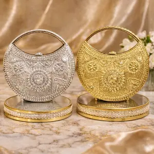 Luxurious Crescent Shaped Metal Handle Clutch with Stone Work - Elegant Design for Special Occasions