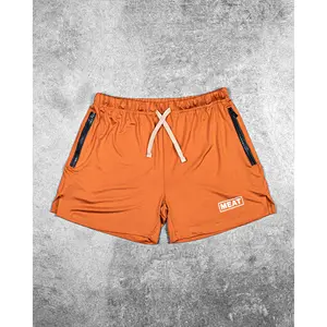 SQUATTING SHORTS – RETRO / AMBER ORANGE