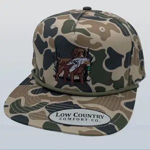 Low Country Comfort Co. Camo Snapback Hat with Embroidered Dog and Duck Design for Outdoor Enthusiasts