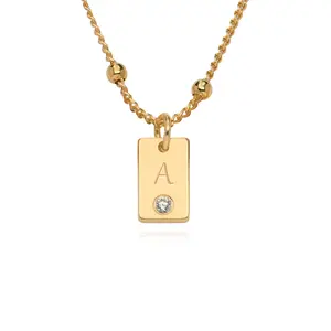MYKA Custom Initial Tag Necklace with Cubic Zirconia in 18K Gold Plating fashion necklace