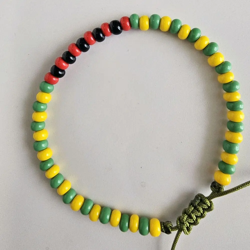 Pulso ajustable de Orula con Elegua Pulso ajustable de Orula con Elegua