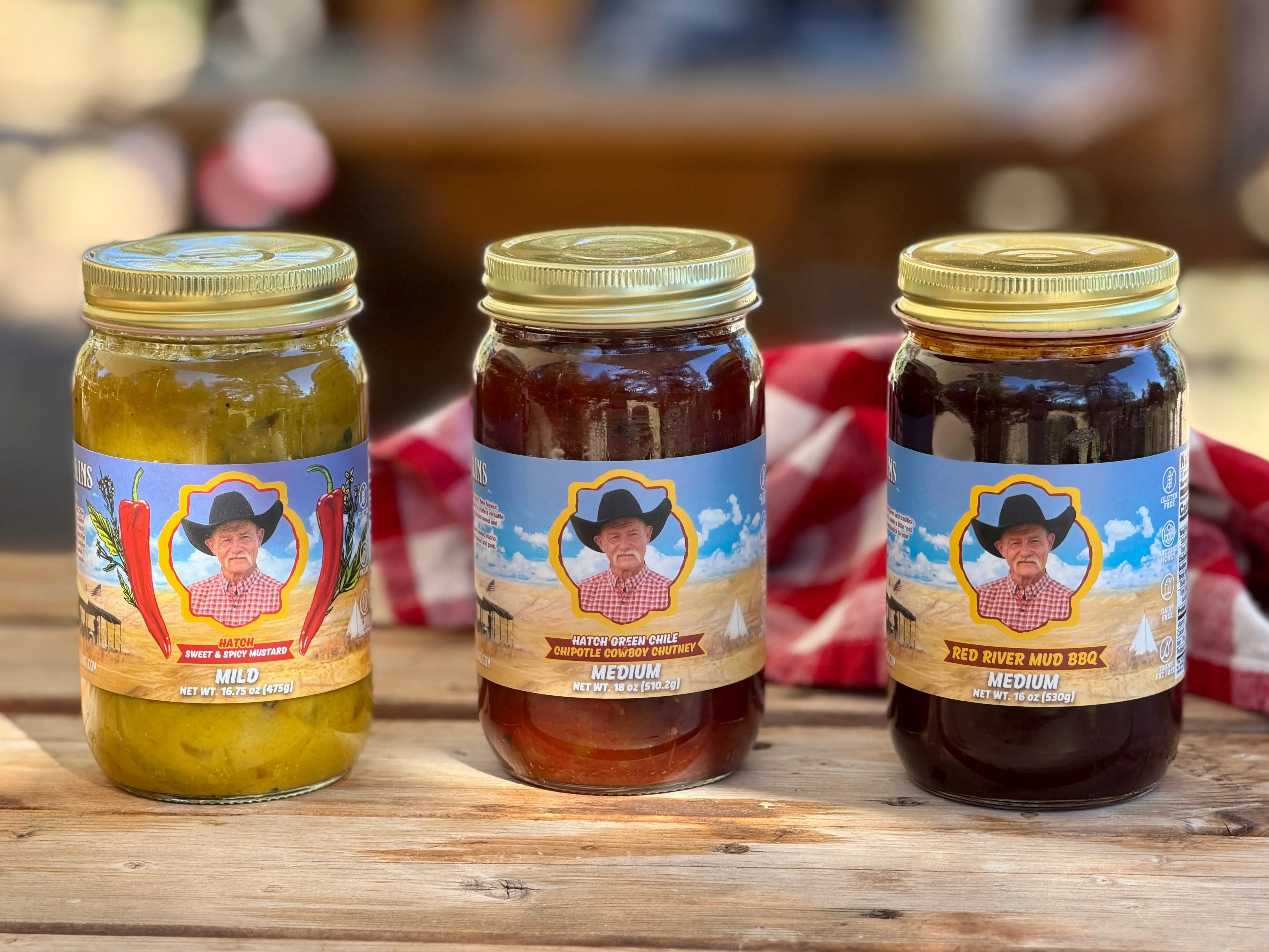 Kent Rollins' Cowboy Sauce Set of 3 - Glass Jar, Ambient, Fat-Free Hatch Mustard, Red River Mud BBQ Sauce, Green Chile Chipotle Relish (Cowboy Chutney) - Bold Flavor Dip & Ingredient for Chicken, Beef