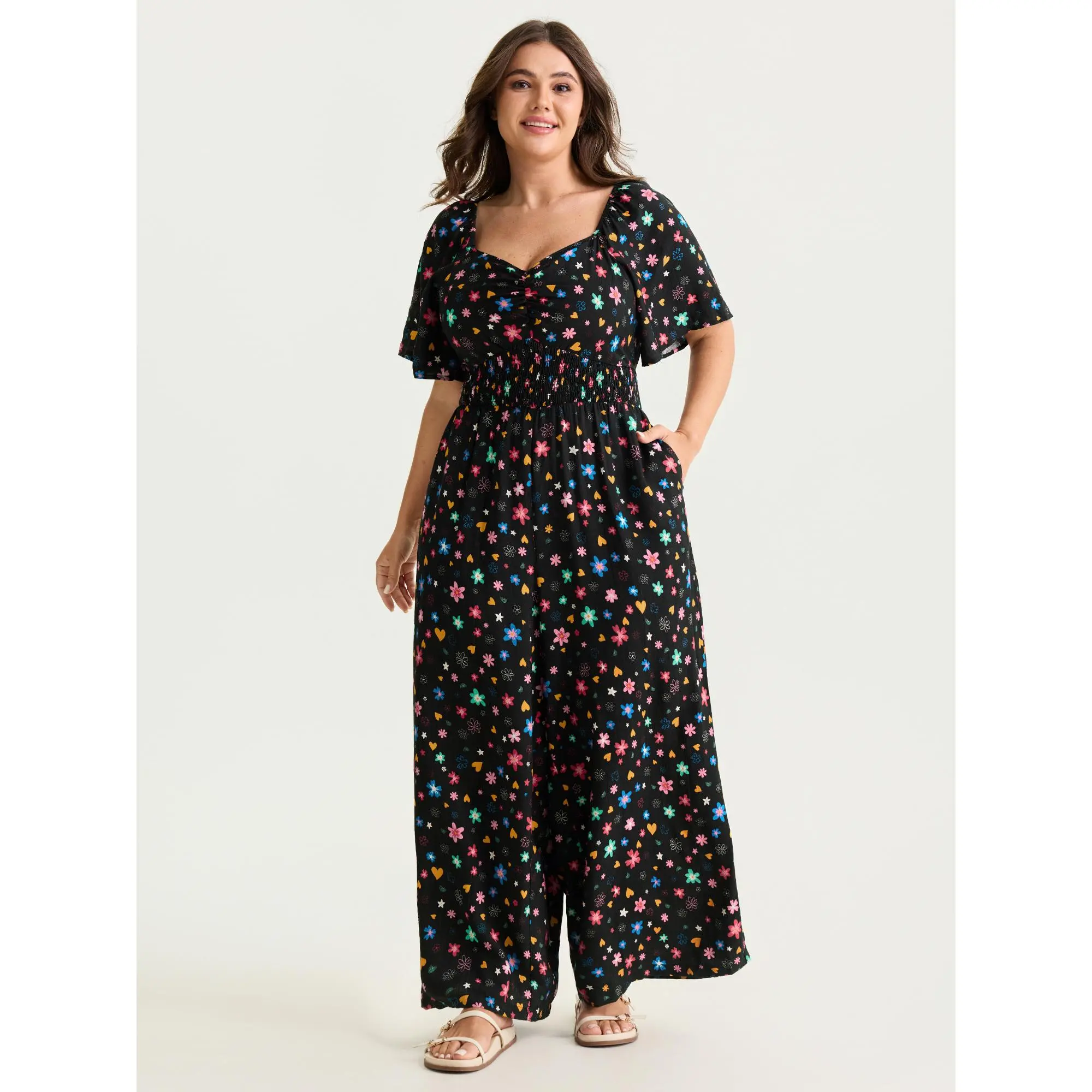 BloomChic Women's Plus Size Cute Floral 2-in-1 Overalls Romper - Casual Short-Sleeve, Curvy-Friendly, Smocked Waist, Pockets, Smooth Rayon-Nylon Blend, Playful Floral Art, Pocket-Ready Life, Summer Fit (26/4x,28/5x, Cold Wash, Do Not Tumble Dry, Low Iron)