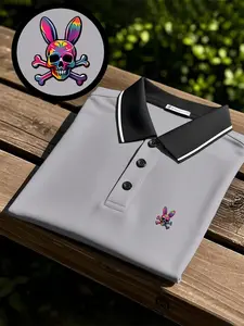 Men's quick-drying polo shirt short-sleeve model features a skull rabbit head logo print design. It is breathable and comfortable for sports wear, does not fade, has a full-body fitting cut, and uses sweat-absorbing, non-sticky, durable craftsmanship.