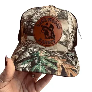 Backwoods Bandit Camo & Black Hat with Raccoon Brown Leatherette Patch Adjustable Snapback 5-Panel Mid-Profile Design