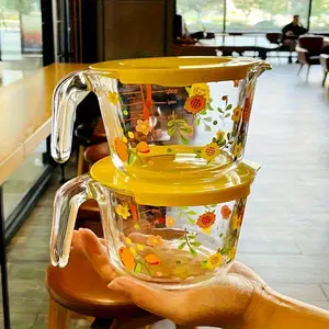 Covered Flower Glass Measuring Cup - Heat-resistant, Microwave-safe, BPA-free, Ideal for Baking, Cooking, and Morning Milk/Cold Drinks, Reusable Oval Design with Handle and Measurement Marks, Vibrant Floral Pattern
