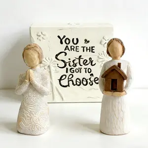 Exquisite resin home decor items, including sister keepsake boxes, housewarming figurines, and praying angel ornaments—adorable gifts and desktop decorations suitable for display on desks, shelves, or entryways.