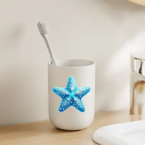 1pc toothbrush cup, bathroom mug, wash cup, or mouthwash cup with a blue starfish pattern a perfect gift for family and friends.