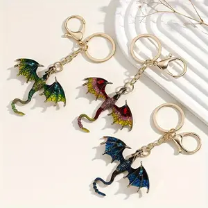 A fashionable retro oil drip gradual change dragon shape pendant personality gorgeous diamond accessories couple keychain