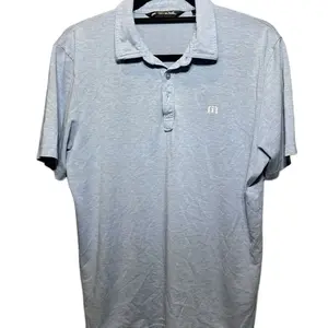 Travis Mathew solid blue golf polo size medium
