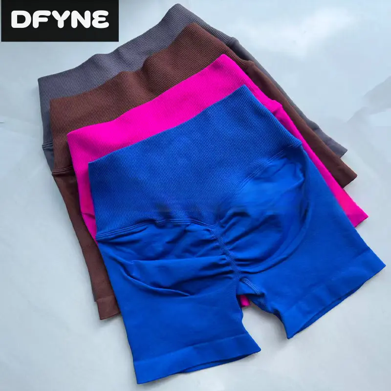DFYNE patchwork cross-waist shorts, ruched for a lifted hip and low-rise design, seamless three-quarter length perfect for a sexy look even at the gym