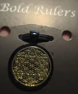 Merkaba in the Flower of Life Gold Sacred Geometry, EMF Protection Jewelry featured in the award-winning movie ZERO LIMITS