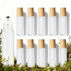 10 Pack Frosted Glass Roll-On Bottles 10ML Portable Essential Oil Travel Kit with Wooden Cap Film Reusable for Aromatherapy Beauty Care Hair Care Cleaning