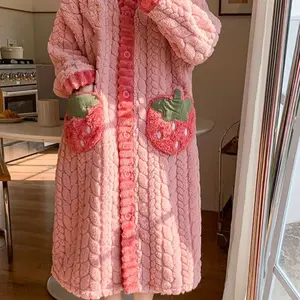 Women’s comfortable coral-colored wool robe with strawberry pocket — casual V-neck, long sleeves; thick plush autumn–winter loungewear; machine washable; suitable for facial cleansing; available as a women’s formal dress or pajama option.