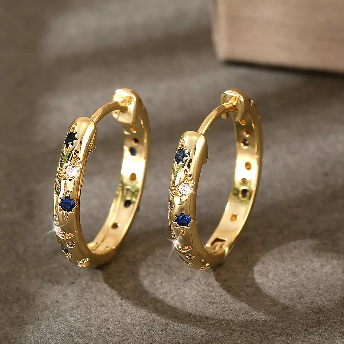 A Pair of Luxurious Copper Earrings Inlaid with Colorful Synthetic Zirconia Stones, Featuring a Fashionable And Versatile Star And Design, Perfect As a Holiday Gift for Women on Special Occasions
